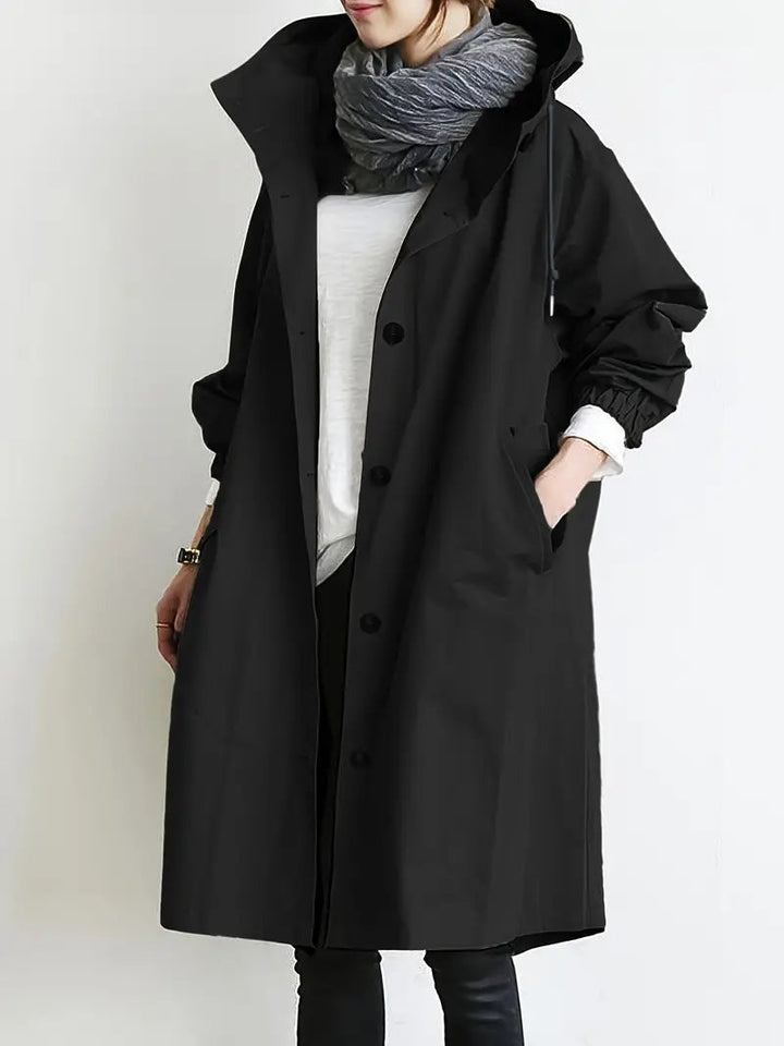 Abbigliamento pioggia donna, giacca autunnale impermeabile con cappuccio e polsini regolabili per comfort.