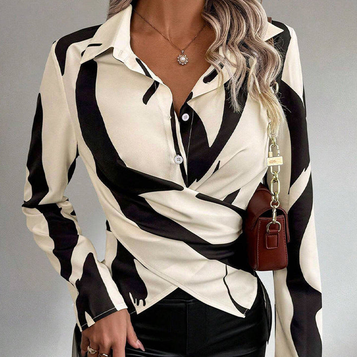 Camicia donna slim fit con maniche lunghe e dettagli a lacci a contrasto. Look moderno ed elegante per ogni occasione.