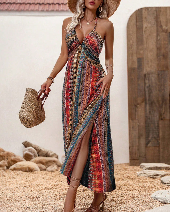 Abito donna estivo midi con spalline sottili, fantasia floreale multicolore, un must-have per la moda estiva.