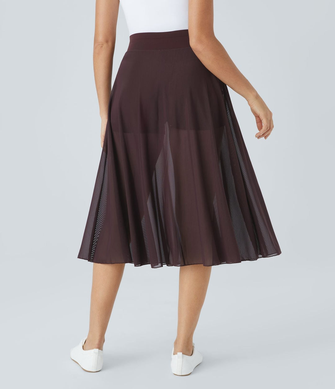 Gonna donna a vita alta, midi, con tasca. Versatile per ogni stagione. Eleganza assicurata.