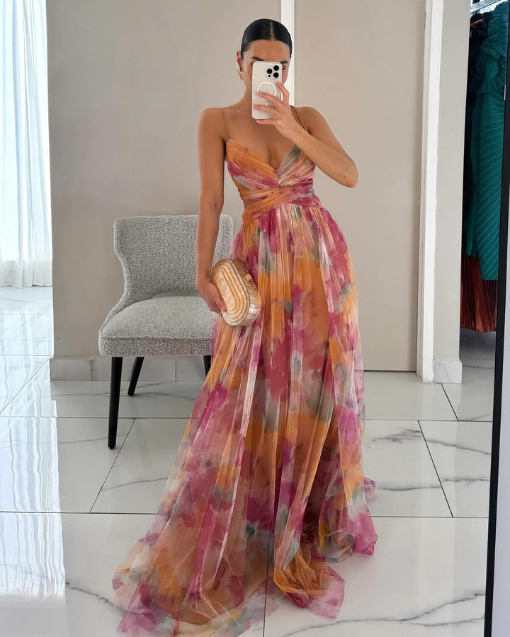 Abito lungo elegante donna con stampa accattivante e allacciatura regolabile. Perfetto per serate estive.