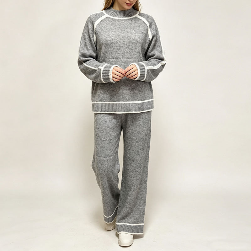 Moda donna: completo coordinato due pezzi con top color block e pantaloni. Ideale per uno stile quotidiano versatile.