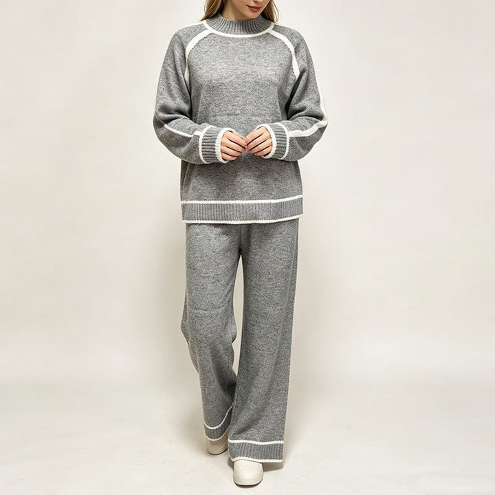 Moda donna: completo coordinato due pezzi con top color block e pantaloni. Ideale per uno stile quotidiano versatile.