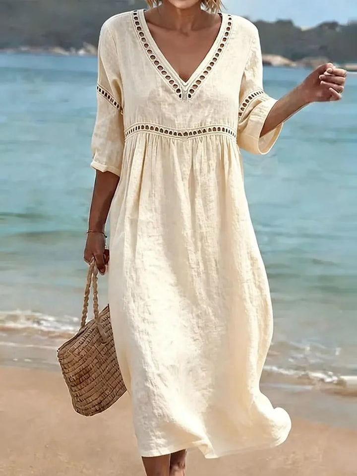 Vestito estivo midi in cotone traspirante, comodo e casual, perfetto per spiaggia e moda donna estiva.