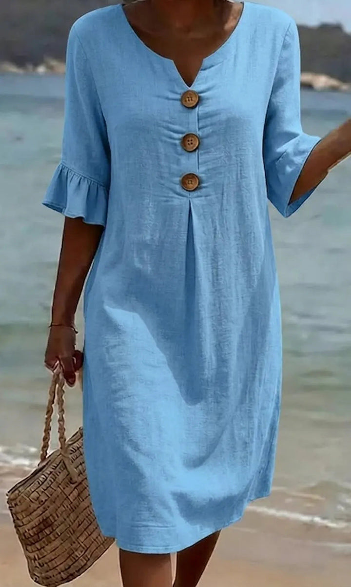 Vestito estivo donna in cotone lino, stile casual chic, bottoni frontali. Per vacanze e tempo libero.