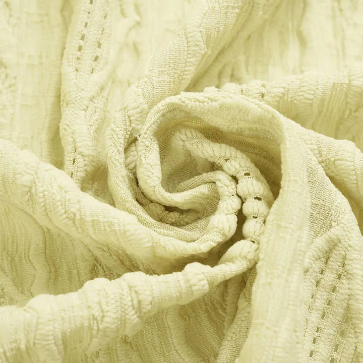 Cardigan donna leggero traforato, maniche 3/4, per un outfit fresco e alla moda.