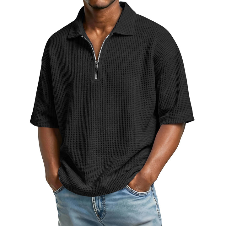 Polo uomo casual-elegante, in maglia a nido d'ape con maniche corte. Perfetta per spiaggia e vacanze.