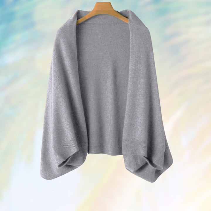 Sciarpa di lana premium donna, piegata e pronta come regalo invernale elegante e caldo.