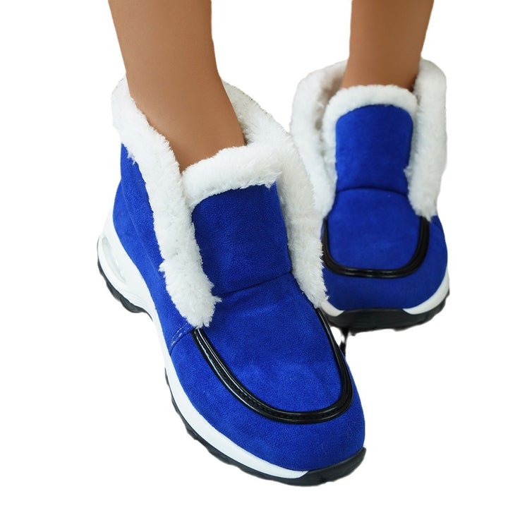 Stivaletti donna blu invernali, vista laterale. Zeppa platform alta e comoda, modello slip-on.