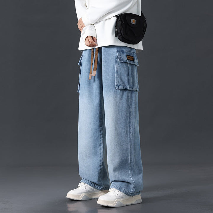 Jeans a gamba larga uomo, effetto sfumato blu grigio, perfetti per un look casual e confortevole.