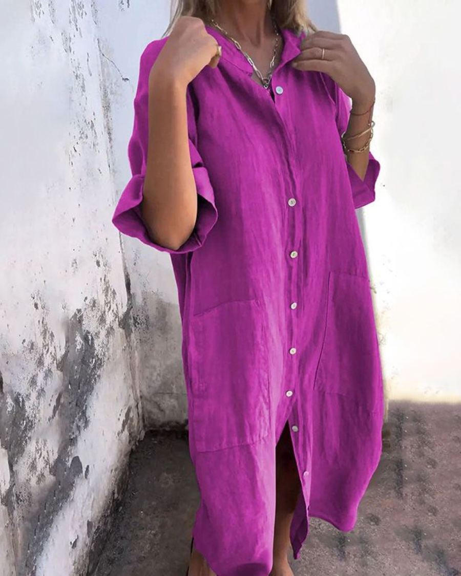 Elegante abito midi estivo da donna in violetto, stile casual chic, maniche corte, perfetto comfort.