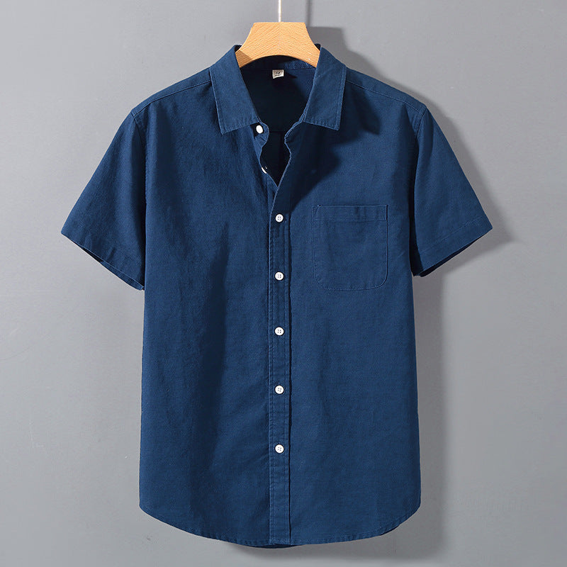 Camicia uomo estiva casual a maniche corte con colletto revers e vestibilità ampia, ideale per il comfort.