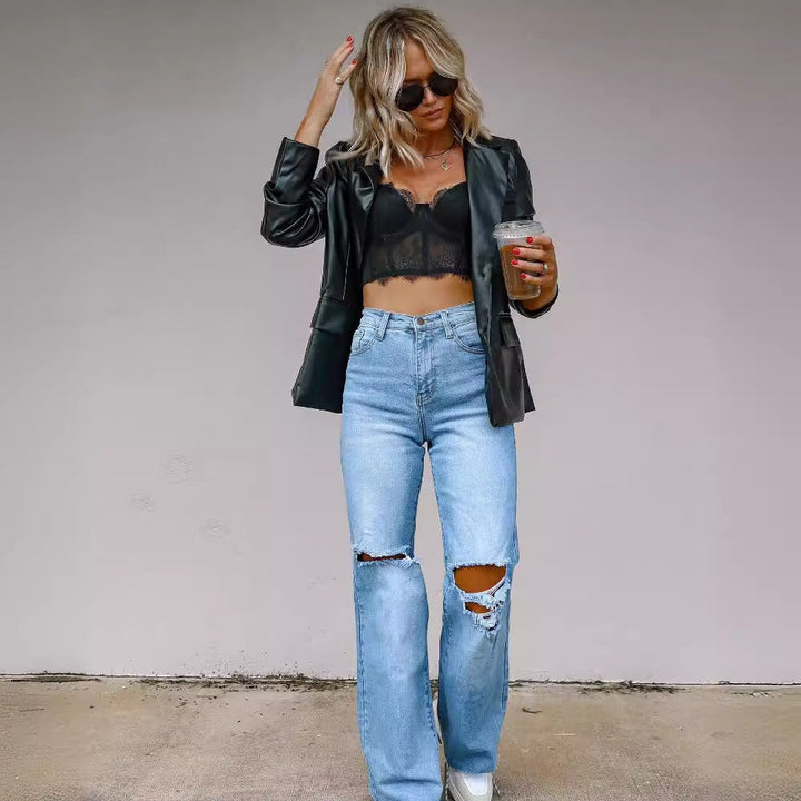 Pantaloni jeans donna a vita alta con strappi moderni e gamba dritta, ideali per un look casual e trendy.