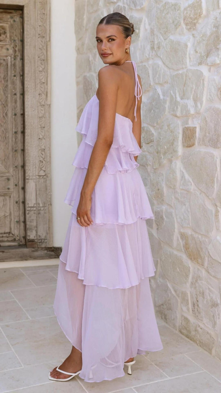 Vestito femminile lungo, stampa floreale vibrante, spalle scoperte. Ideale per vacanze.