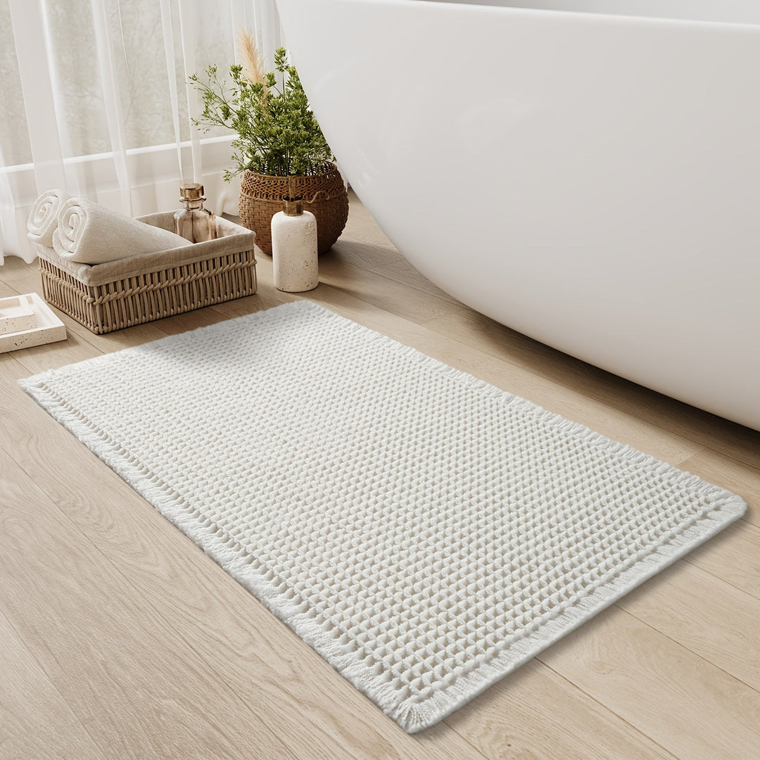 Asciugatura rapida con questo tappeto doccia a nido d'ape, antiscivolo e ultra assorbente per il tuo bagno.