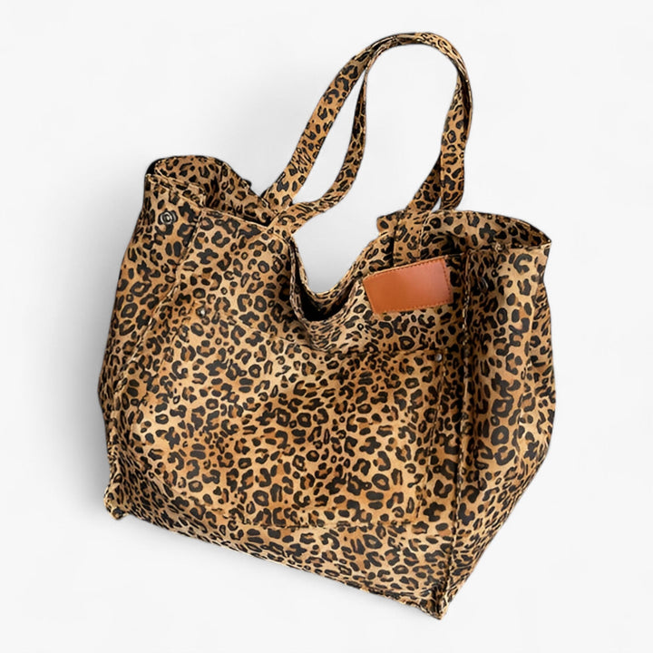 Borsa tote ampia donna con stampa leopardata, accessorio moda ideale per viaggio e uso quotidiano.