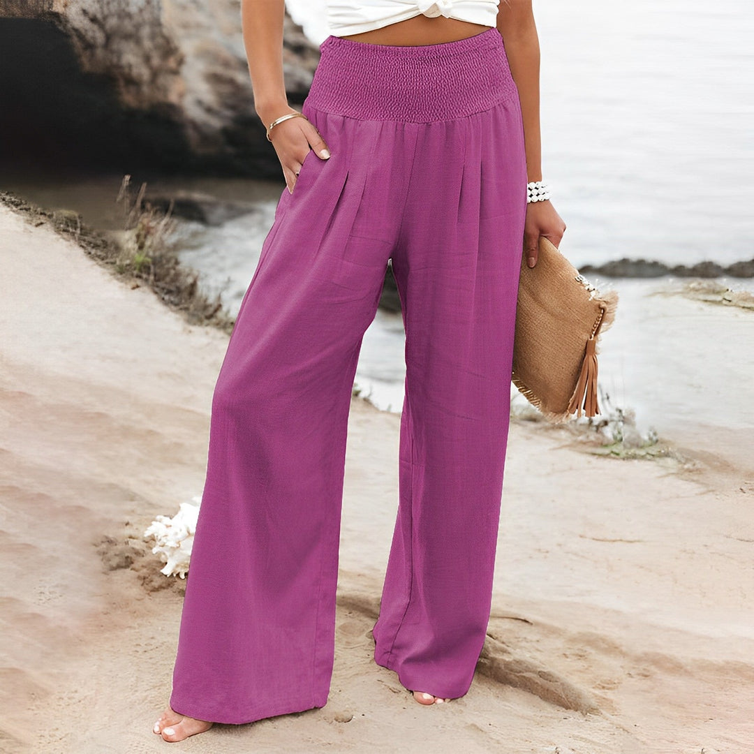 Pantaloni da donna a vita alta, modello palazzo, perfetti per un outfit estivo comodo ma sempre elegante.