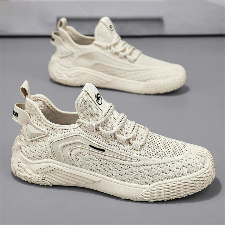 Dettaglio sneakers uomo grigie, con lacci. Moda uomo, scarpe casual ideali per il tempo libero.