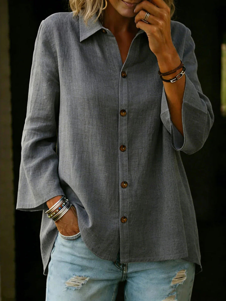 Blusa donna casual-chic, manica tre quarti, tinta unita, perfetta per outfit primaverili.