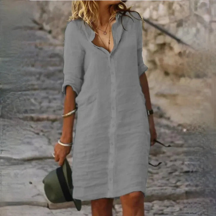 Elegante abito fluttuante donna senza maniche, capo must-have per la primavera/estate. Stile casual e femminile.
