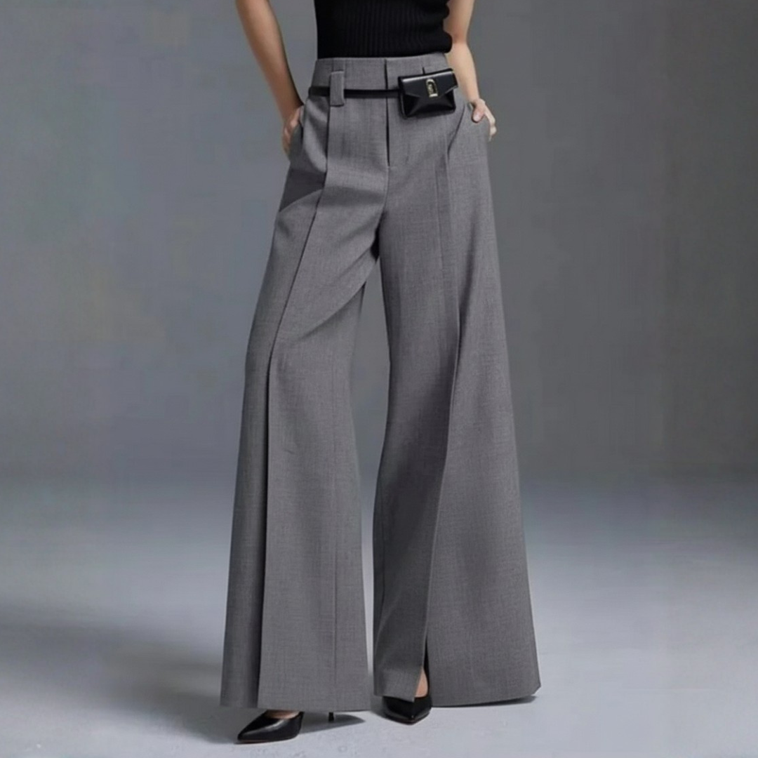 Pantaloni donna per ufficio, vita alta e gamba larga. Abbigliamento versatile e moderno, unisce eleganza e comfort.