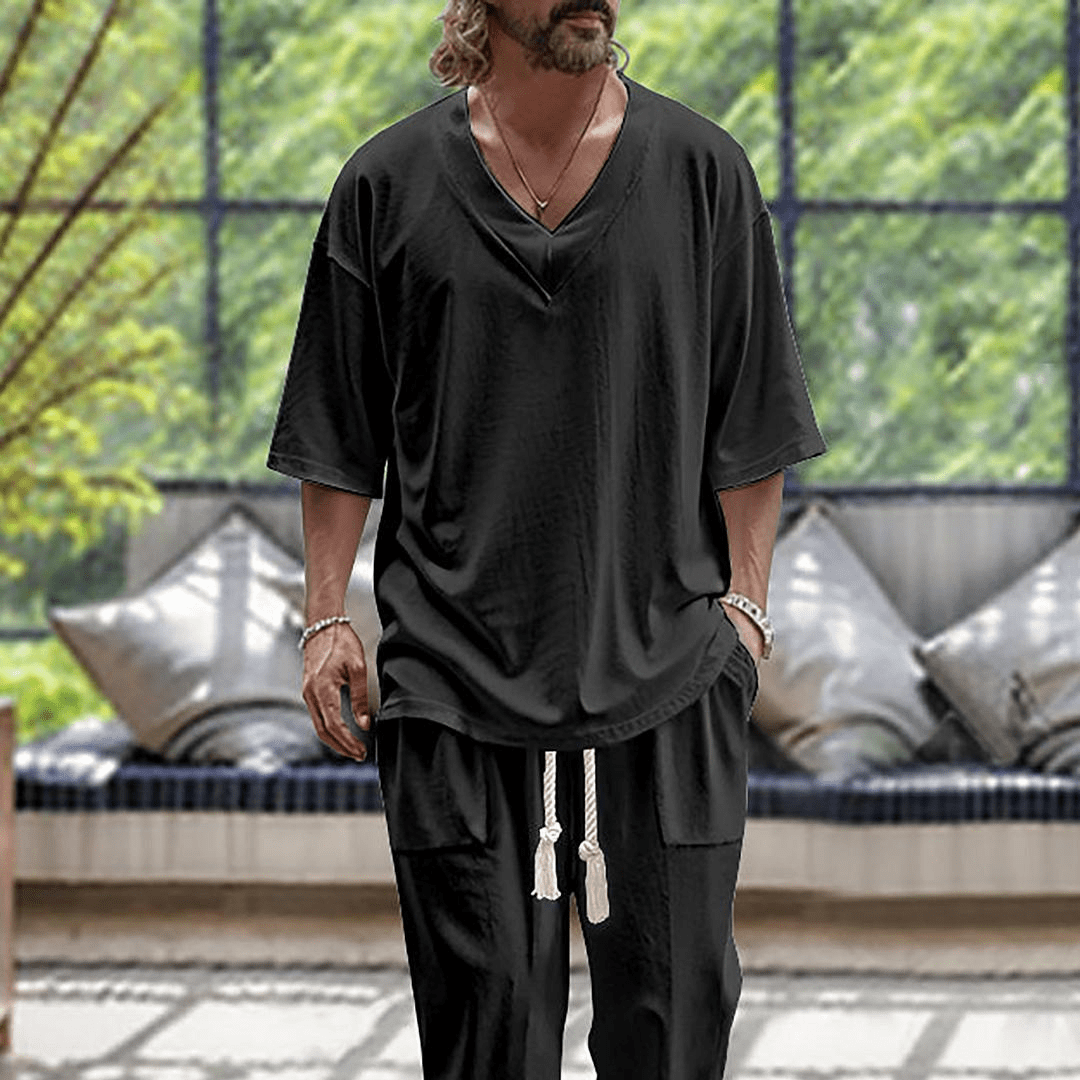 Set abbigliamento uomo oversize casual, maglia a maniche lunghe e pantaloni coordinati per un comfort ottimale.
