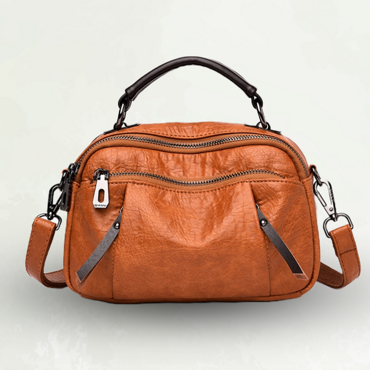 Accessorio moda: borsa a mano donna multicolore vibrante, con tracolla staccabile, versatile e chic.