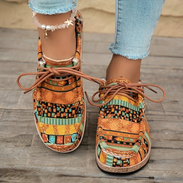 Sneakers donna artistiche ammortizzate per comfort quotidiano e passeggio. Design leggero e casual.