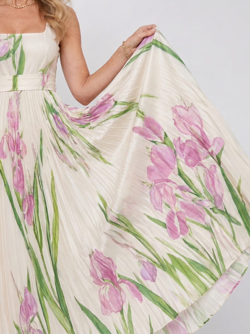Femminile abito midi plissettato senza maniche, scollo quadrato, ideale per look estivi eleganti e vacanze.
