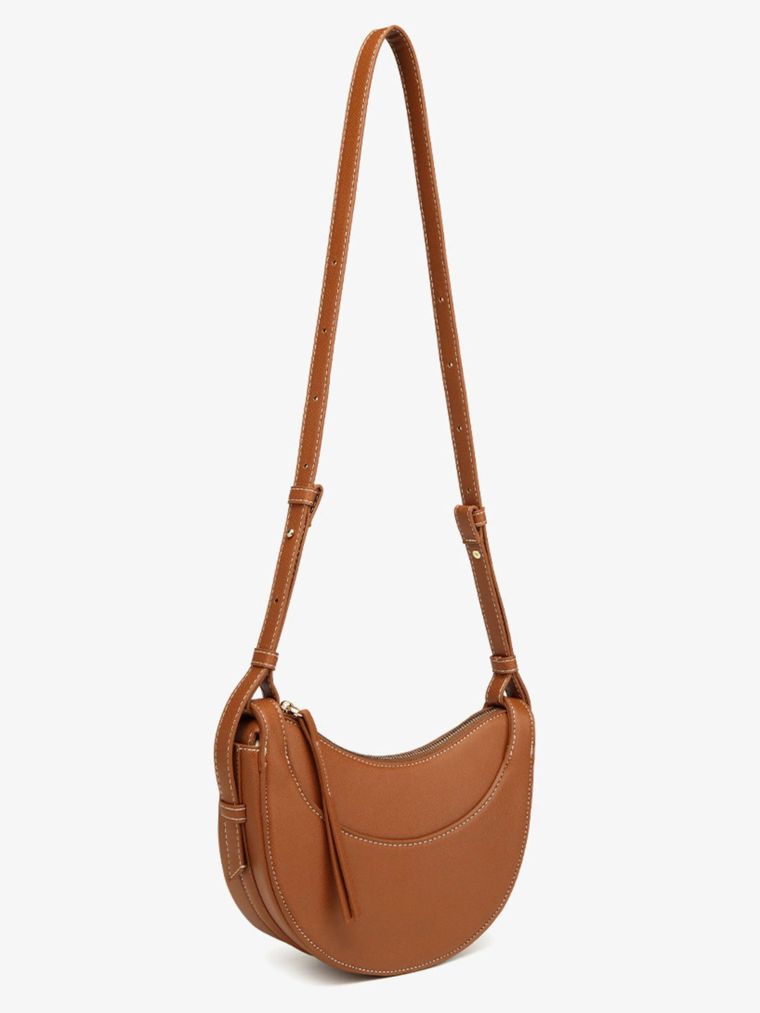 Borsa donna a tracolla curva, con nappina decorativa, per uno stile quotidiano e chic.