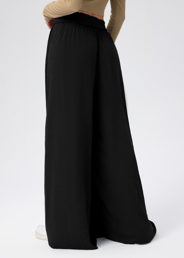 Pantaloni estivi donna, morbidi, a gamba larga. Vita elasticizzata per una vestibilità perfetta.