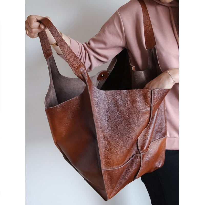Design vintage della borsa a tracolla donna, praticità per il lavoro e il tempo libero.