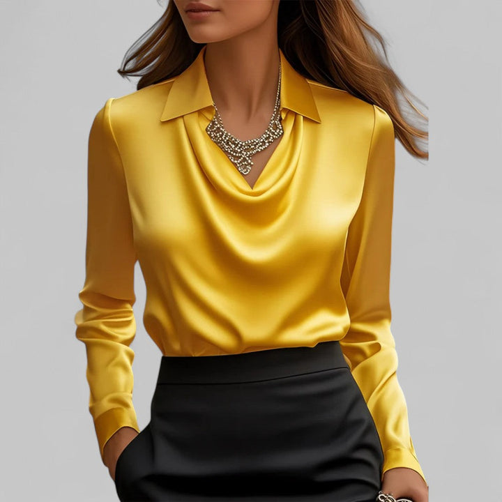 Blusa femminile satinata con collo drappeggiato e maniche lunghe, adatta per ufficio e occasioni speciali.