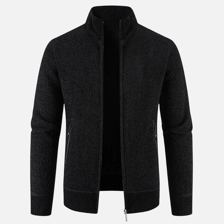 Modello di giacca invernale da uomo grigia, ideale per un look casual e protezione dal freddo.