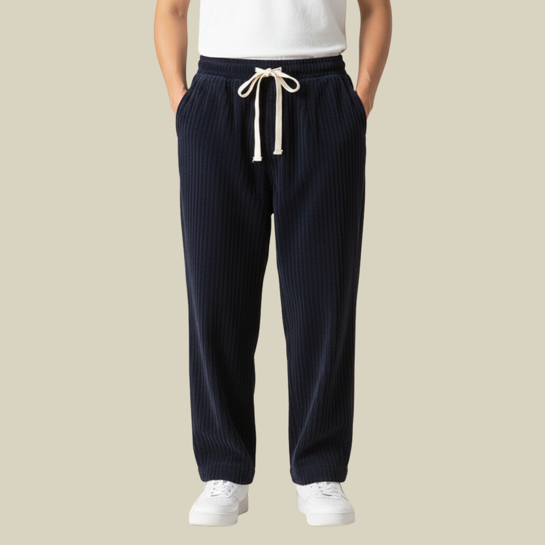 Moda uomo: pantaloni in velluto a coste, vita elastica e tasche. Perfetti per un look casual versatile e di tendenza.