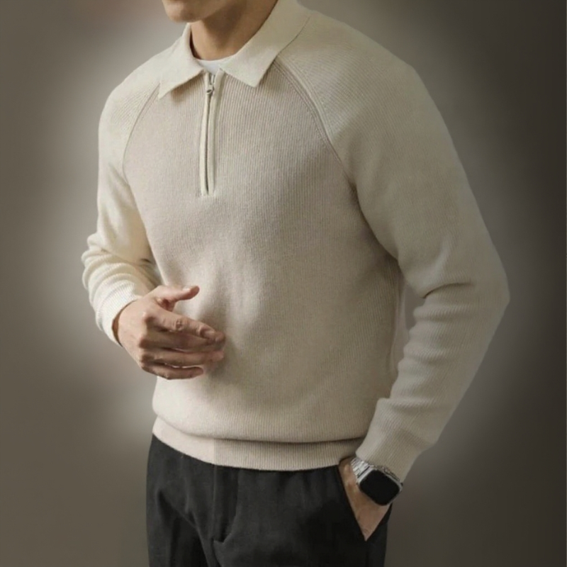 Pullover uomo con collo polo, mezza zip e maniche raglan. Versatile per business e casual.