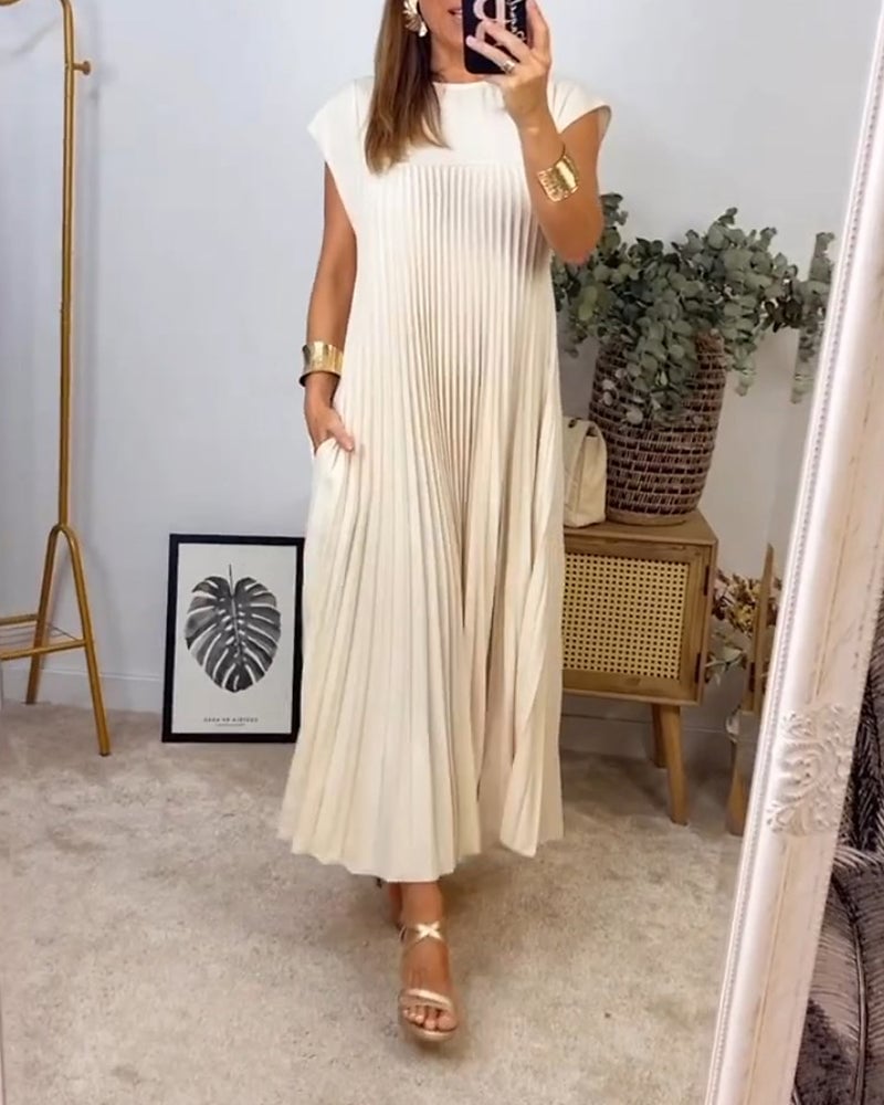 Vestito elegante plissettato donna, taglio maxi e tessuto fluido, ideale per occasioni speciali.
