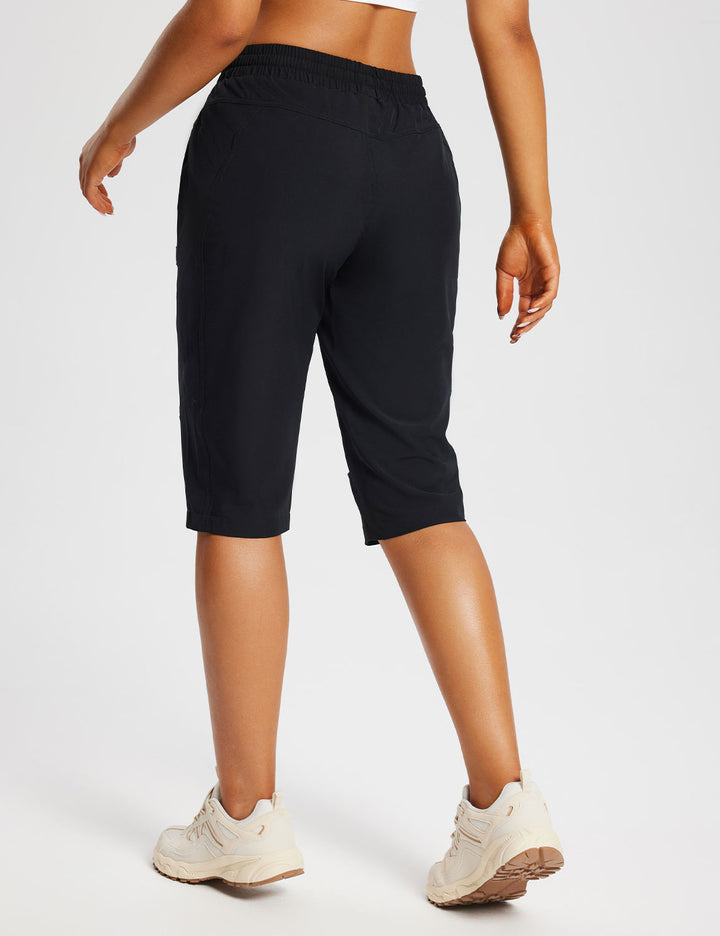 Capri donna leggeri per attività all'aperto, con tasche e protezione UV integrata.