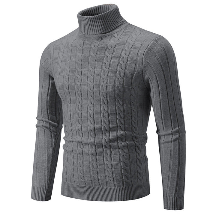 Dettaglio del motivo a treccia su maglione dolcevita uomo slim fit. Tessuto di qualità per l'abbigliamento invernale.