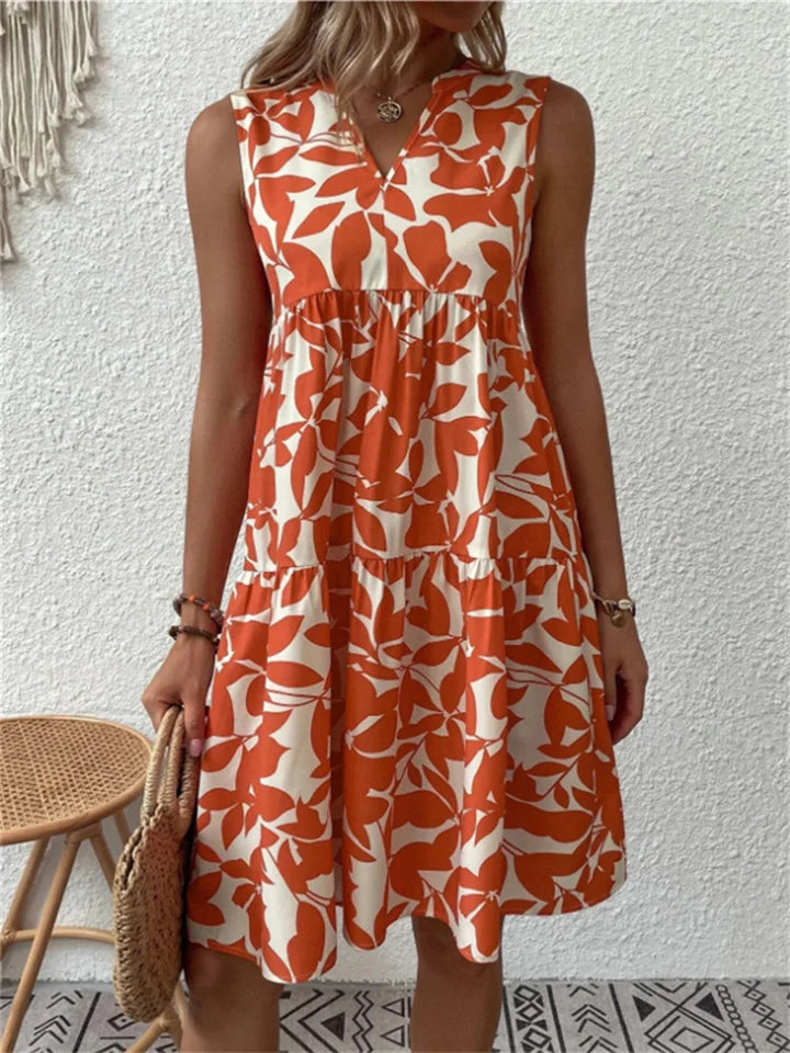 Versatile abito estivo floreale midi da donna, perfetto per eleganza casual primaverile ed estiva.