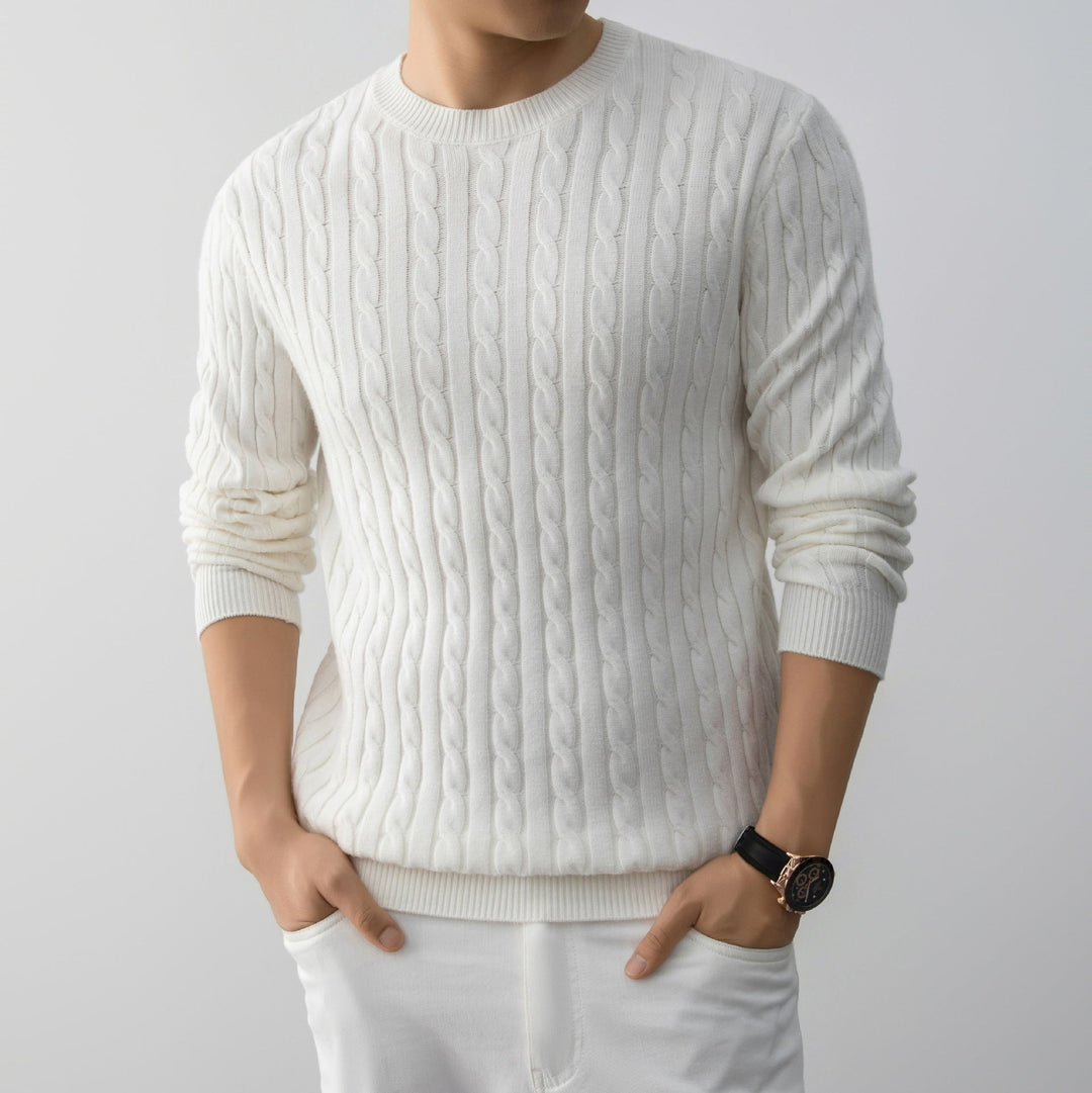Dettaglio motivo jacquard su maglione uomo oversize, maniche lunghe, per un look di tendenza.