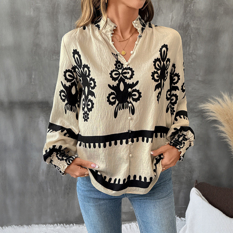 Camicia pullover donna a vestibilità ampia con vivace stampa etnica e maniche a lanterna. Ideale per lo stile casual.