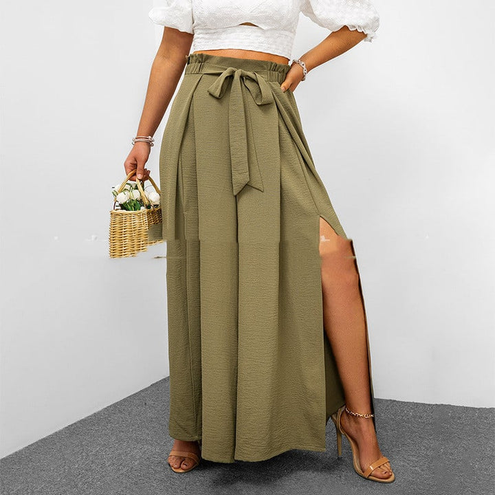 Eleganti pantaloni donna a vita alta con fibbia, gamba larga e lunghezza cropped. Perfetti per ogni stagione.