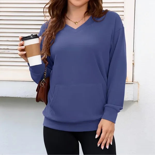 Moda comfort: maglione donna pullover, design casual con tasca frontale, per uno stile moderno e rilassato.