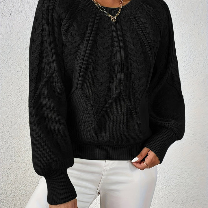 Maglione a trecce, maniche a palloncino, vestibilità comoda. Ideale per la donna moderna.