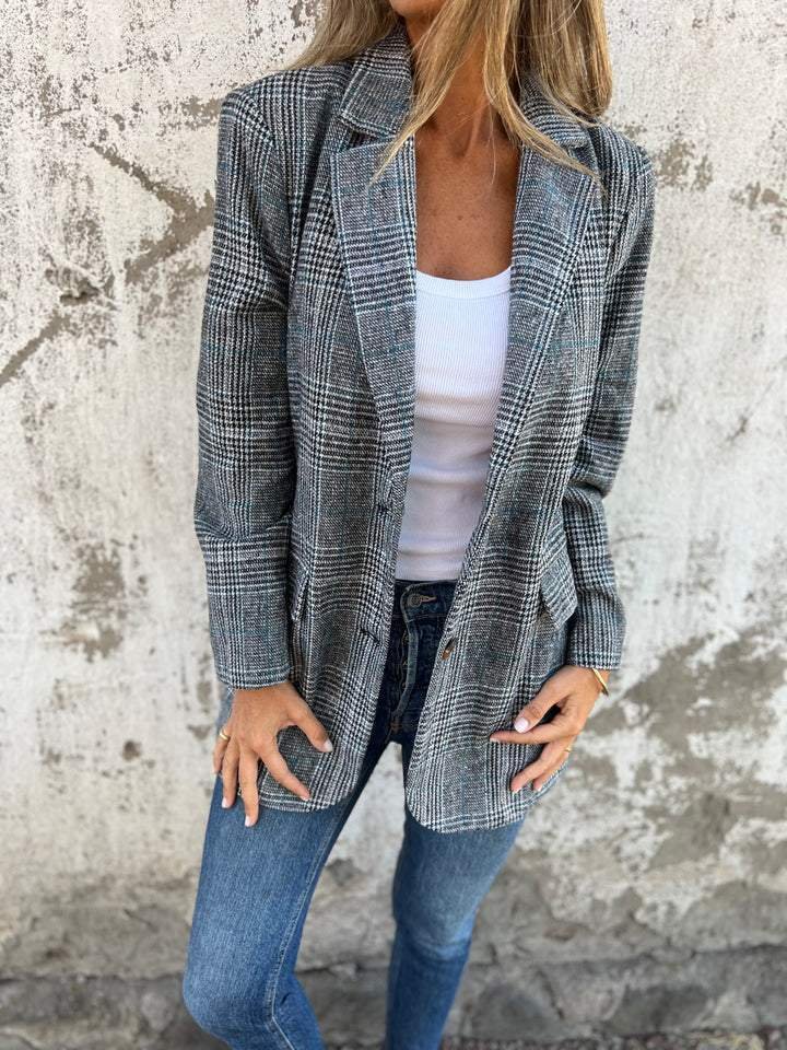 Blazer moda donna a quadri, capo versatile ed elegante per l'ufficio o eventi casual d'autunno-inverno.
