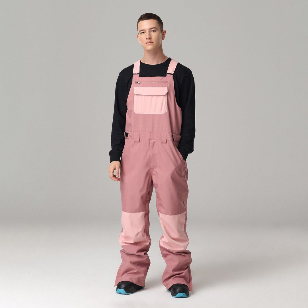 Pantaloni sci unisex con bretelle, robusti e regolabili, perfetti per attività invernali sulla neve.