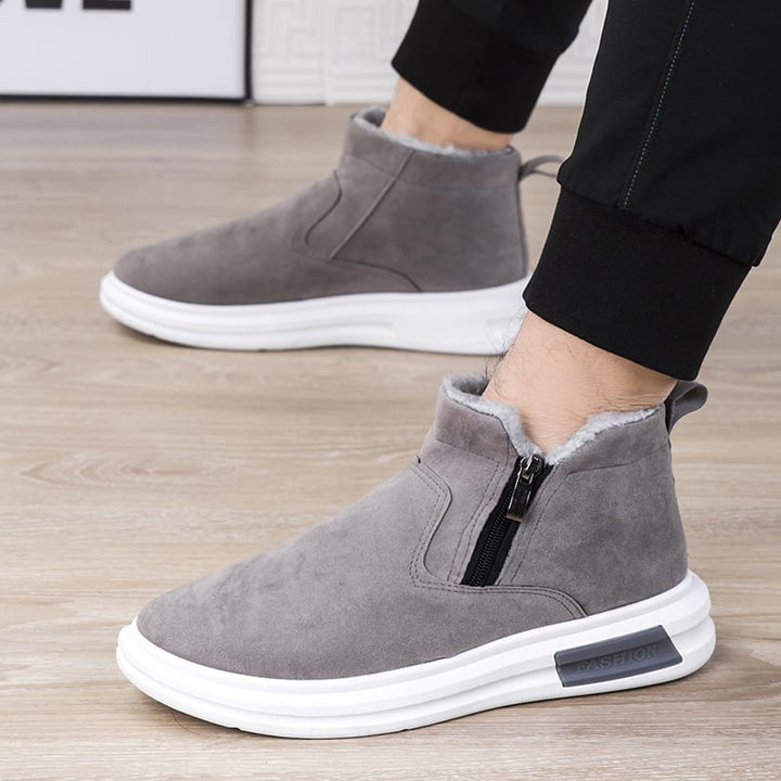 Stivali invernali uomo neri, perfetti per comfort e stile. Calzature casual con zip laterale, ideali per ogni giorno.