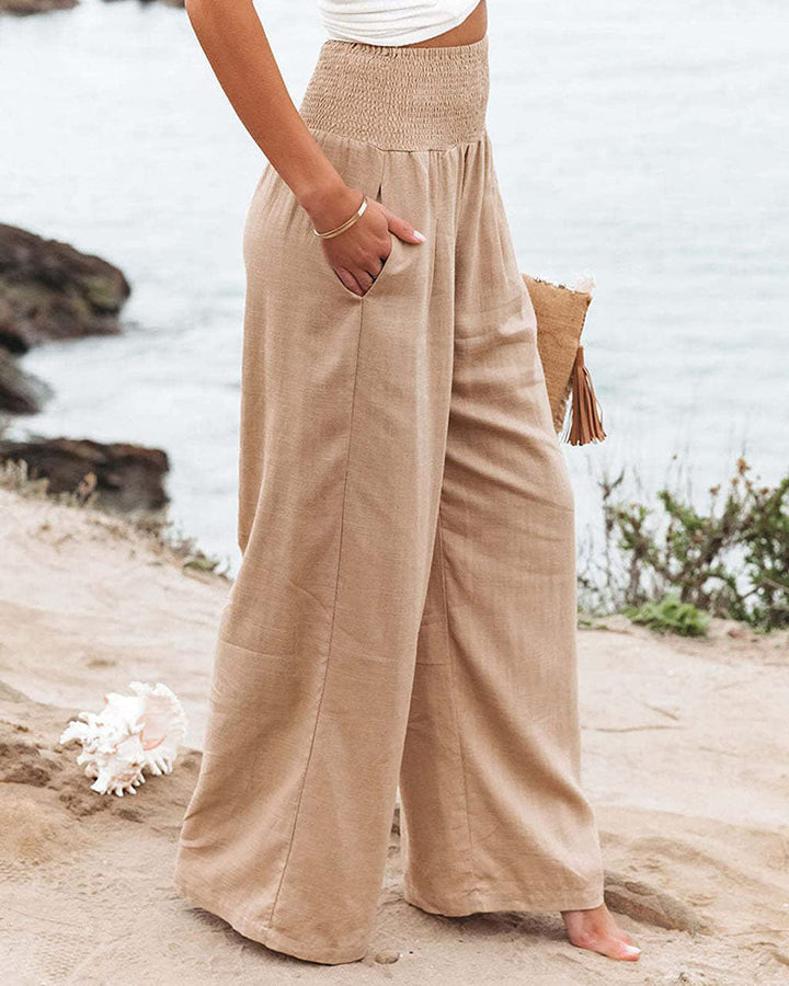 Pantaloni palazzo comodi da donna, vita elastica, per un outfit estivo versatile.