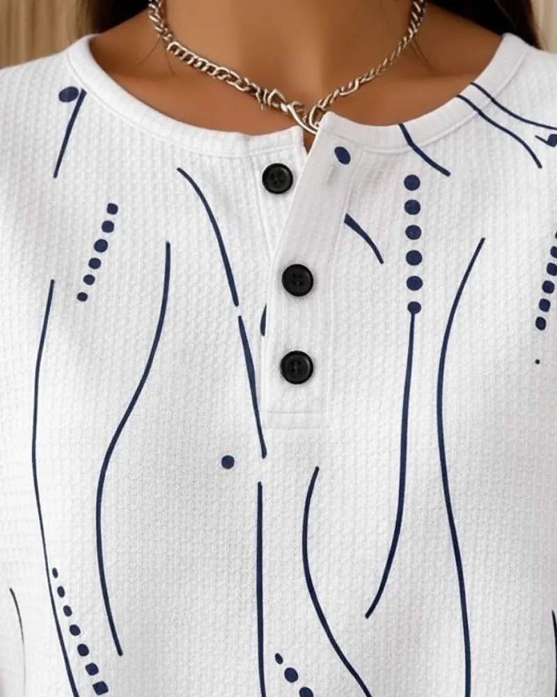 Maglietta donna casual con stampa grafica e bottoni. Stile versatile per primavera estate, massimo comfort quotidiano.